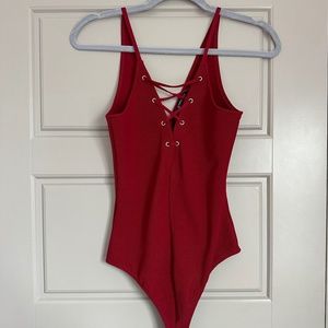 Deep red lace-up bodysuit | Express